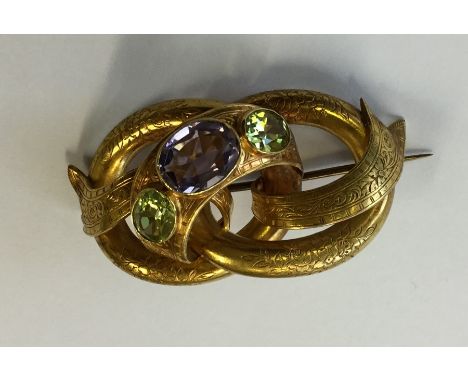 A good quality amethyst pendant engraved with leaves and scrolls. Approx. 17 grams. Est. £600 - £800.