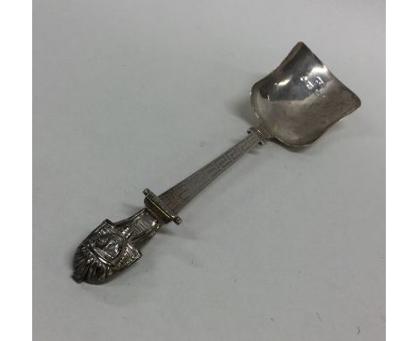 An unusual Victorian silver caddy spoon decorated with Greek key pattern. By H&amp;T. Approx. 13 grams. Est. £30 - £40.