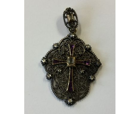A good amethyst and diamond pendant mounted in gold with loop top. Approx. 12 grams. Est. £500 - £800.