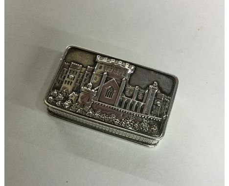 A rare Georgian silver castle top vinaigrette, the body with engine turned decoration. Birmingham. By TP. Approx. 25 grams. E