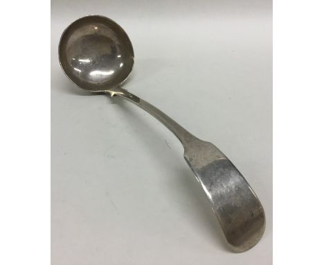 A Scottish fiddle pattern sifter ladle. By JA. Approx. 36 grams. Est. £25 - £35.
