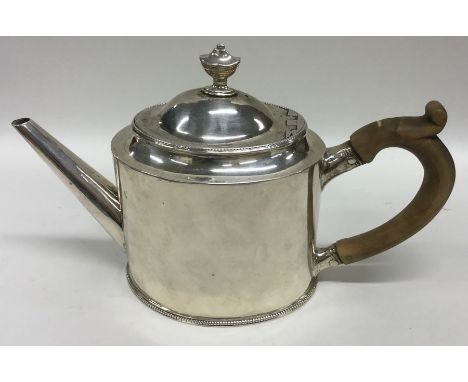 A good Georgian bachelor's teapot with reeded and ball decoration. London. By Hester Bateman. Approx. 333 grams. Est. £450 - 