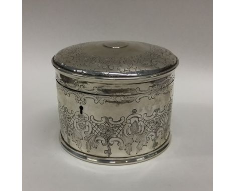 A good quality Victorian engraved tea caddy decorated with flowers and leaves. London. Approx. 322 grams. Est. £300 - £400.