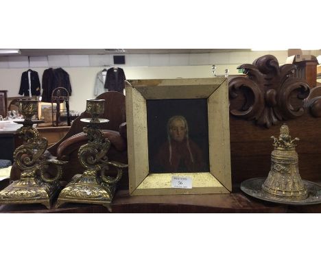 A pair of brass candlesticks, portrait, etc.