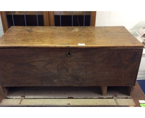A hinged top elm trunk.