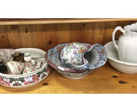 Numerous jug and basin sets.