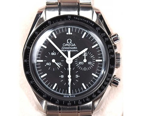 A stainless steel Omega Speedmaster Professional wristwatchThe black circular dial with baton hour markers, three subsidiary 