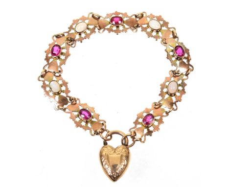 An early 20th Century synthetic ruby and opal braceletThe oval shaped synthetic ruby, and oval opal cabochon line, within ope