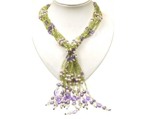 A multi-gem necklace The multi-strand peridot, cultured pearl and amethyst necklet with white metal push-piece clasp, length 