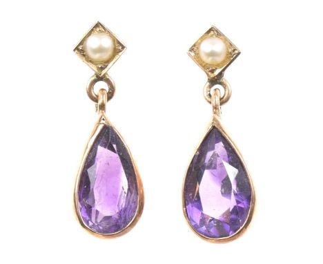 A pair of amethyst and split pearl earringsEach designed as a pear shaped amethyst drop suspended from a split pearl surmount