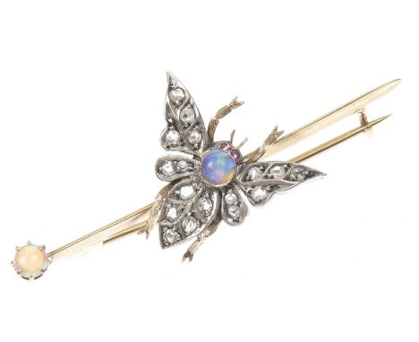 A Victorian vari gem bug broochThe bug with circular opal cabochon, rose cut diamond body and red gem eyes, atop the polished