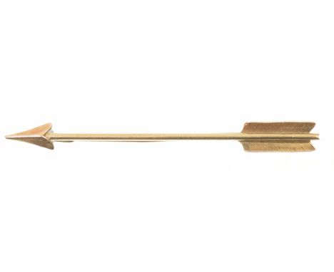 An early 20th Century bar broochDesigned as an arrow, stamped 9ct to reverse, length 5.5cm, weight approx. 2.4g.CONDITION REP