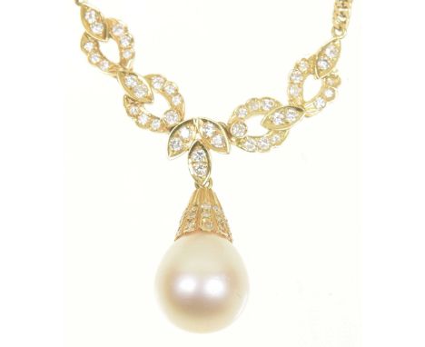 A cultured pearl and diamond necklaceThe cultured pearl drop with a brilliant cut diamond cap, suspended from a similarly cut