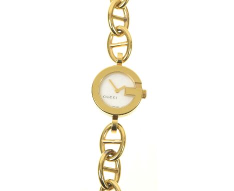 A ladies stainless steel Gucci quartz wristwatchThe circular mother of pearl dial with foliate decoration, signed Gucci, with