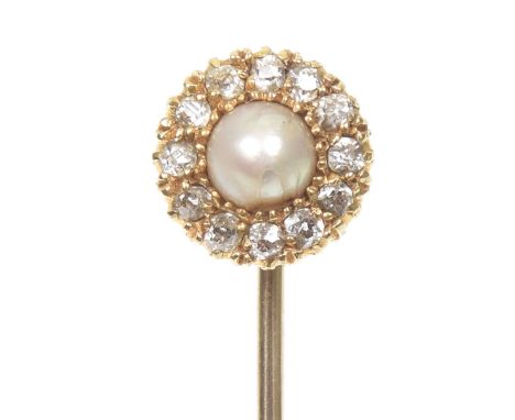 A split pearl and diamond stickpinDesigned as a split pearl and old cut diamond cluster, may also be worn as a dress stud, es