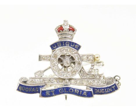 An enamel and diamond Royal Artillery broochThe vari cut diamond and seed pearl set cannon with a blue enamelled banner inscr