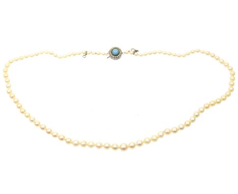 A cultured pearl necklaceThe single strand of graduated cultured pearls with a blue glass clasp, stamped 835, length 52cm.CON