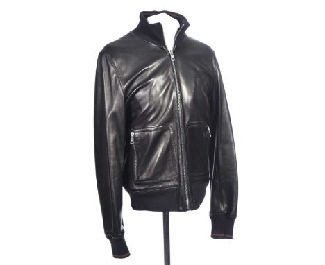 A gents Gucci leather bomber jacketThe black leather jacket with black wool collar and cuffs, accented with the brands red an