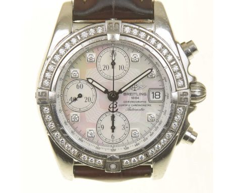 A stainless Breitling chronograph wristwatchThe circular mother of pearl dial with diamond hour markers, date aperture to 3 a