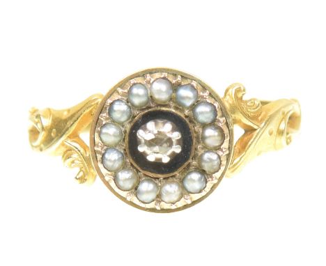 A late Victorian diamond enamel and split pearl memorial ringThe rose cut diamond atop the circular black enamel disc within 