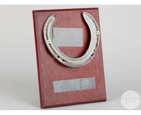 Shoe worn by the racehorse Timarida when winning the Grosser Dullmayer Prix Bayeriches Zuchrennen at Munich in 1996,mounted o