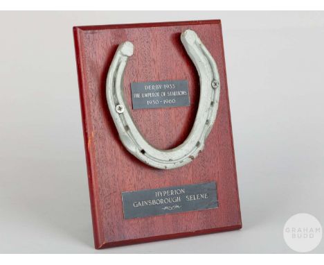 Shoe worn by the racehorse Hyperion,mounted on a wooden plaque with easel support and set with engraved metal plaques, 20 by 