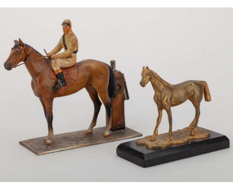 An Austrian cold painted bronze racehorse &amp; jockey cigarette lighter/match striker,17 by 19cm., good condition; sold toge