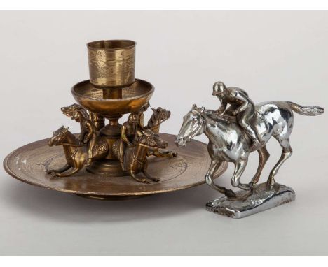 Victorian gilt-brass cigar lighter designed with four racehorses & jockeys,the horses radiating from the central stem, below 