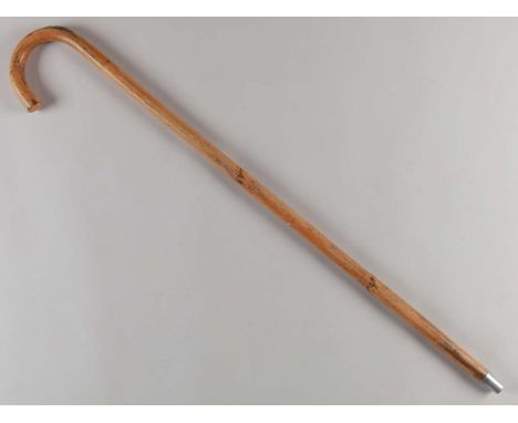 A walking stick/horse measure,the wooden cane with an extending steel measure calibrated up to 17 hands, with metric equivale