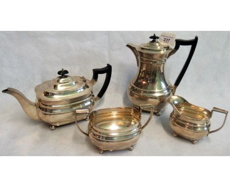 A four piece silver tea set, consisting: teapot, coffee pot, milk jug and sugar bowl, each of plain decoration, with ribbed w