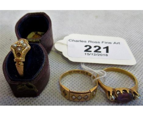 Three gold and pearl set lady's rings, one with a central oval amethyst.