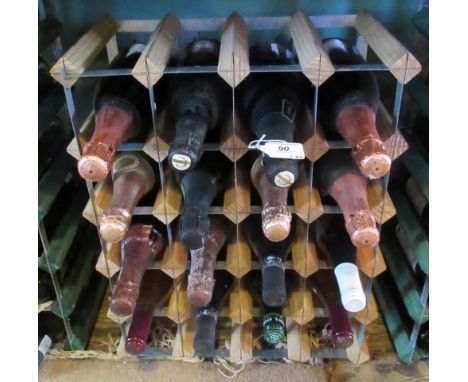 Sixteen bottles of mixed champagne and other sparkling wines, to include wine rack.