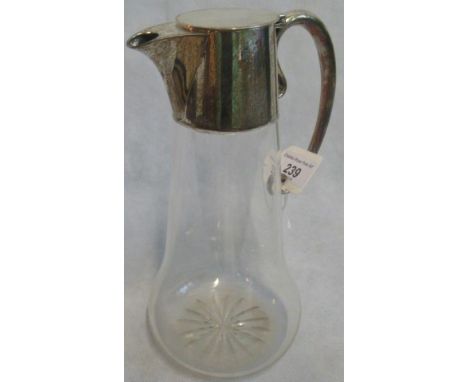 A silver topped plain glass claret jug by John Heath &amp; John Middleton, London hallmarks.