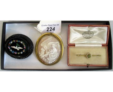 A boxed seed pearl and pendant bar brooch, together with a cameo brooch and a jet brooch with inlaid mosaic central panel.