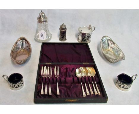 A collection of silver pieces, to include: a lidded mustard pot, two salts and a lidded pepper, each with open work decoratio