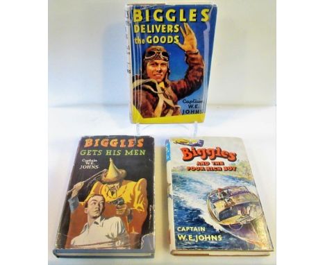 Three First Edition volumes: Biggles Gets His Men, Biggles Delivers the Goods and Biggles And The Poor Rich Boy.