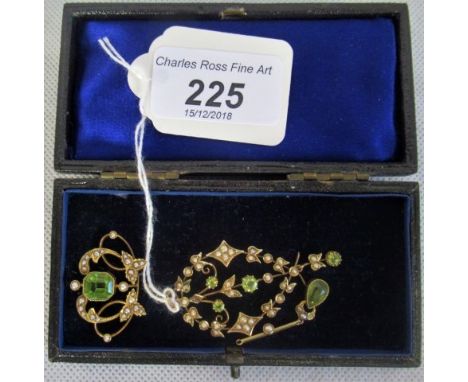 Three early pendant and seed pearl pendants, each of individual design. Condition Report: All peridot and seed pearl.  The la