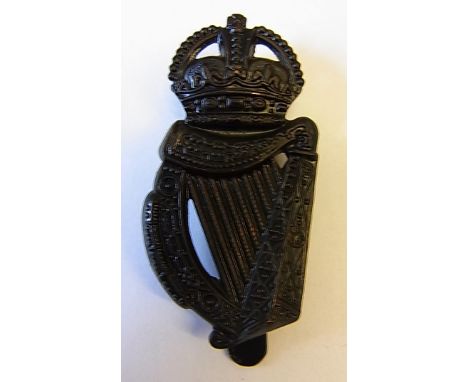 18th London Regiment (London Irish Rifles) Cap Badge. KC (Blackened Brass, slider) maker J. R. Gaunt. London. K&K: 1848