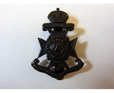 21st London Regiment (First surrey Rifles) WWI cap badge, KC (Blackened Brass, slider) Rare specimen with incorrect date of 1