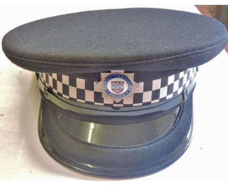 British Transport Police Inspectors peaked cap, with chrome and enamel badge (QC) as made by Weston Cap limited. Large size.