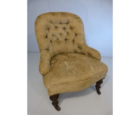 Button back nursing chair on turned wooden legs 