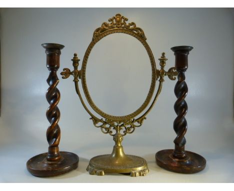 Antique brass mirror frame, oak barley twist candlesticks and a wrought iron 19th Century door knocker