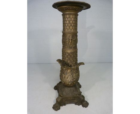 Unusual cast metal plant stand / Torchere with scale type set top leading to a panel of men and a floral base