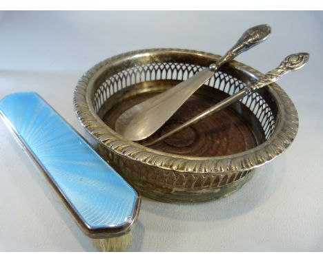 Silver coloured bottle coaster along with a Guilloche enamel and silver mounted brush, hallmarked silver handled shoe horn an