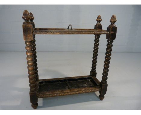 Carved oak umbrella / Stick stand with original trays. 