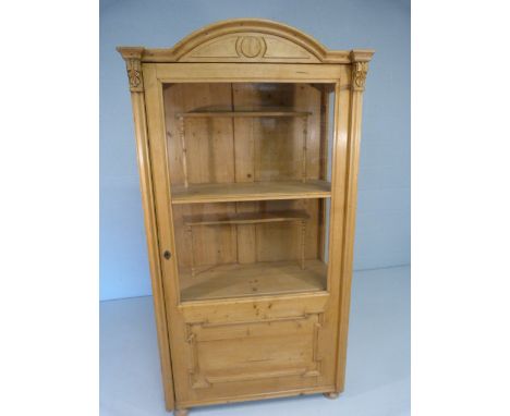 Antique pine glazed cabinet with single opening door. Fitted interior with raised shelf on shelf. - Key in Office