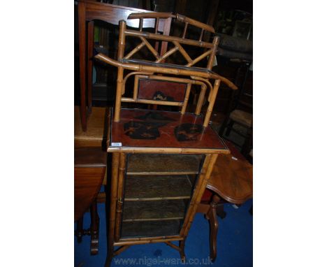 A late 19th c. Oriental Cabinet, of Bamboo construction with galleried back with Japanned shelf over the Japanned top depicti