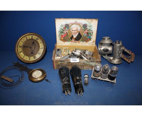 A Clock movement, various old bulbs, bicycle lamp, etc.