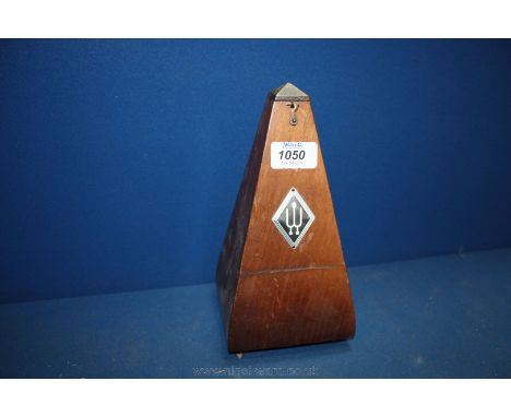 A wooden cased Metronome