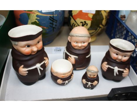 A quantity of Goebel Monk figures including two jugs, egg cup, pepper pot and lidded bowl